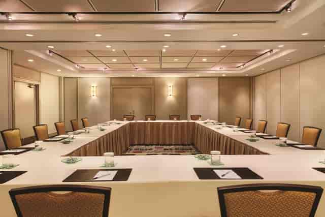 Meeting room at DoubleTree by Hilton Toronto with U-shaped seating for corporate events.