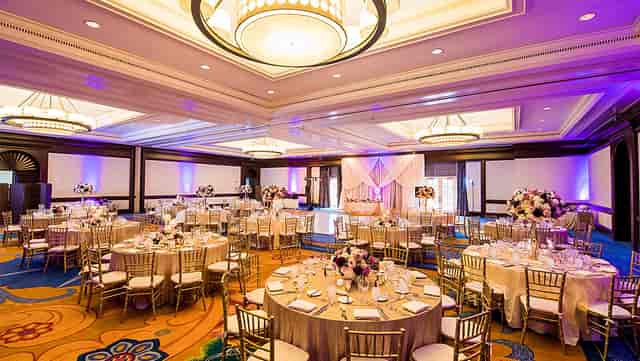 Poinsettia Ballroom at Omni La Costa Resort, elegant wedding venue with floral decor.