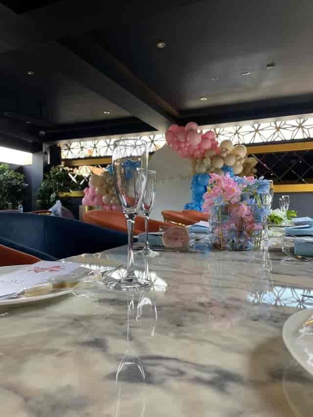 Elegant table setting with floral centerpieces for birthday parties and baby showers.