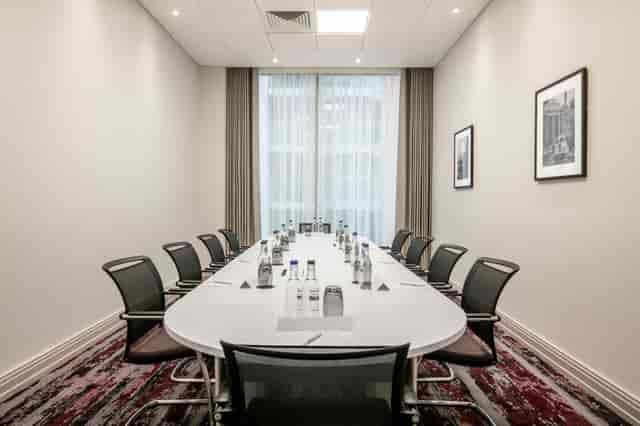 Modern meeting room in Mulberry Suite, Crowne Plaza London Docklands, ideal for conferences.