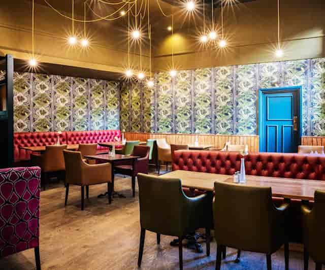 Stylish Auberge London restaurant with vibrant decor, perfect for intimate events.
