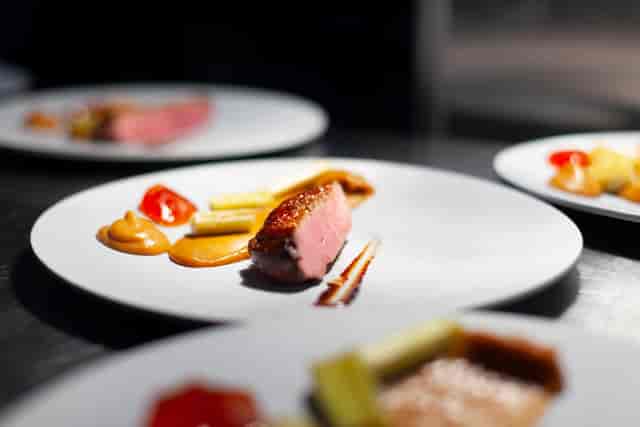 Gourmet dish at Eleven98, showcasing elegant presentation for upscale event catering.