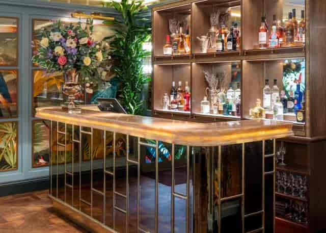 Stylish bar in Butterfly Room, The Ivy in the Park for networking events and cocktail receptions.