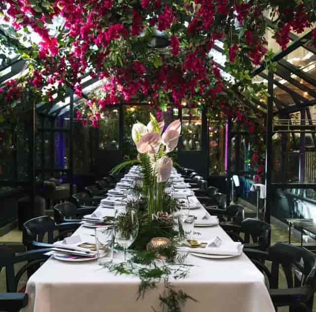 Elegant Wisteria dining space with fine tableware for upscale events and intimate gatherings.