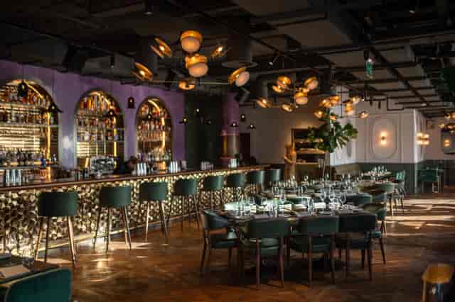 Stylish restaurant venue on 9th floor, ideal for upscale corporate events and gatherings.