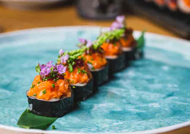 Upscale sushi dish in private dining room, perfect for corporate events and gatherings.