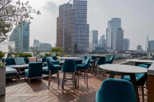 Stylish rooftop venue with skyline views, perfect for events and gatherings.