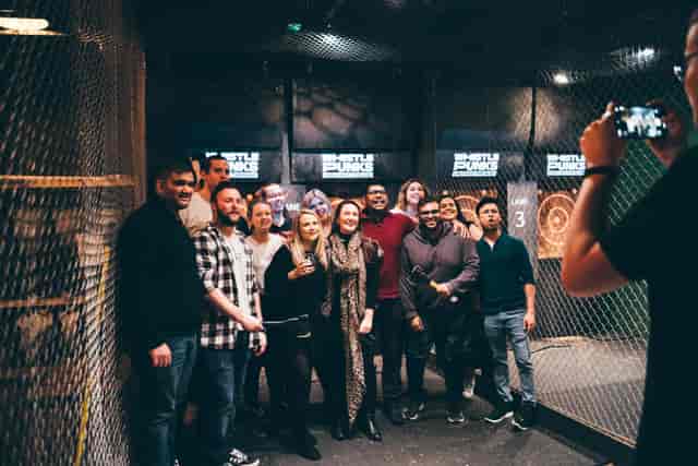 Lively group at Whistle Punks Urban Axe Throwing, ideal for team-building events.