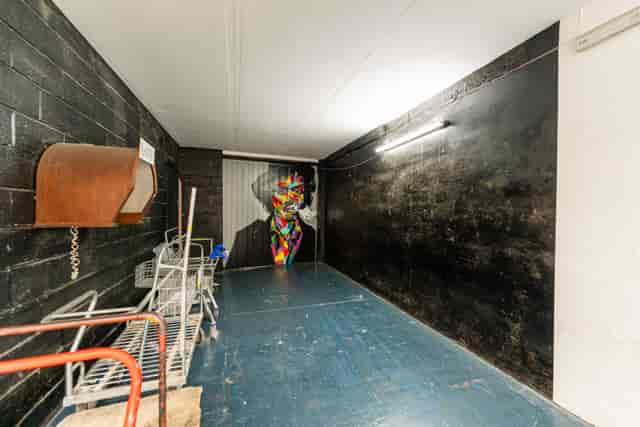 Urban venue with vibrant mural for creative gatherings at 6 Degrees Studios.