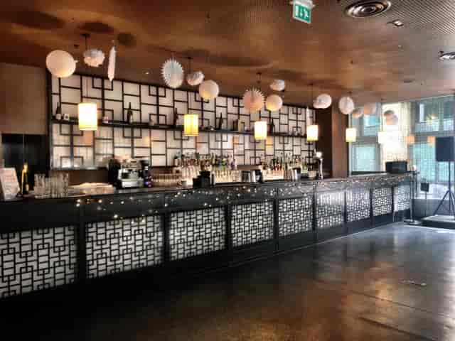 Stylish bar area in Ping Pong Bow Bell's House for networking events and cocktail receptions.