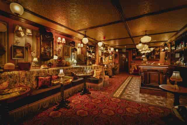Cozy vintage lounge at Mr Fogg's Hat Tavern, perfect for intimate gatherings and events.
