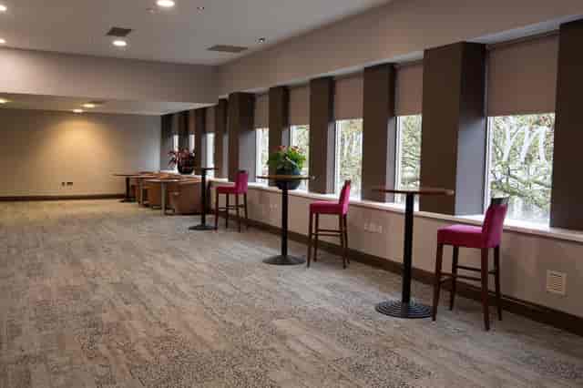 Orchard event space at Mercure Bristol with high-top tables for networking gatherings.