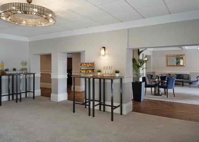 St Pierre Suite event space with elegant lighting, ideal for corporate meetings and gatherings.