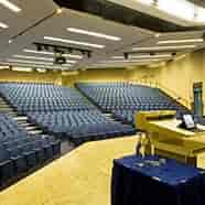 Spacious auditorium with tiered seating for conferences at 20 Bedford Way.