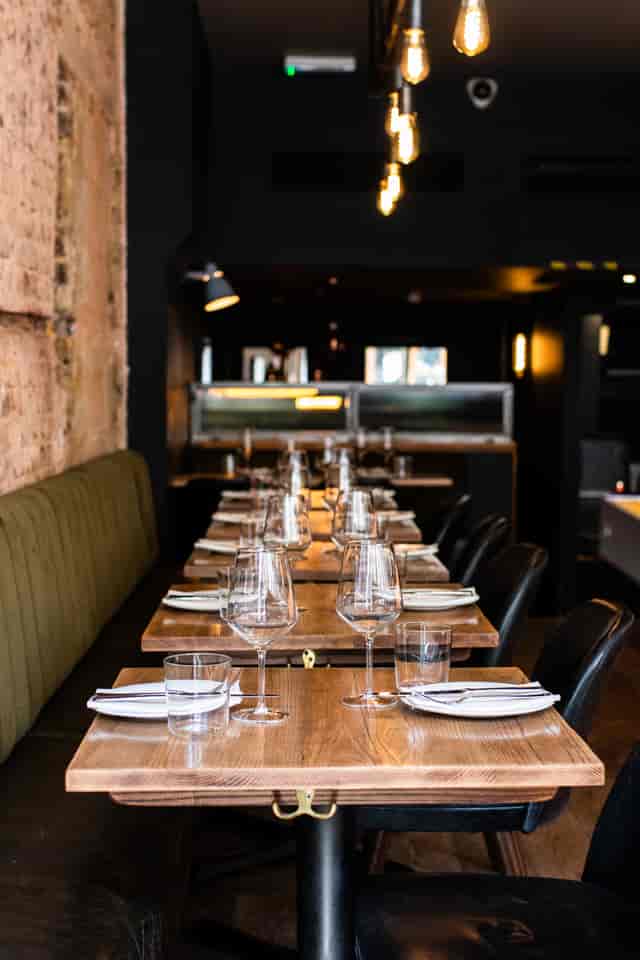 Stylish restaurant setup in The Charcol Room, ideal for intimate gatherings and corporate dinners.
