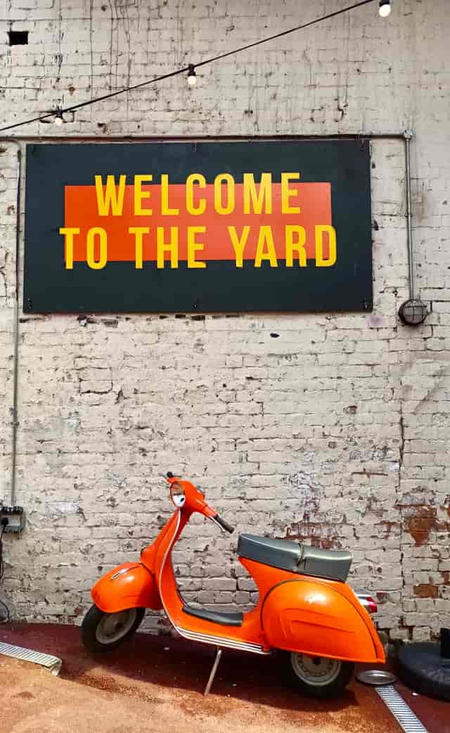 Vibrant rustic venue "The Yard" in The Button Factory, ideal for casual gatherings.