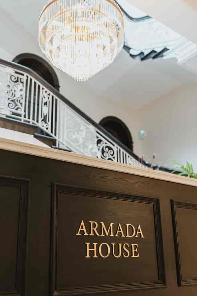 The Blackwell at Armada House grand staircase: elegant venue for networking and formal events.