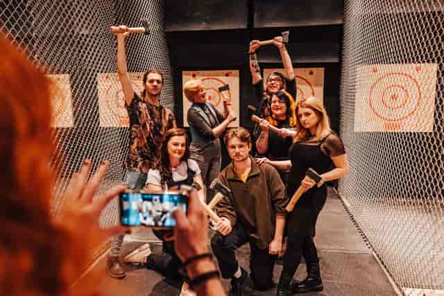 Team-building axe throwing event at Whistle Punks, Oxford Circus, fostering collaboration.