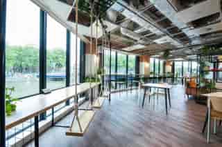 Modern event space with swings and large windows in Runway East Bristol.
