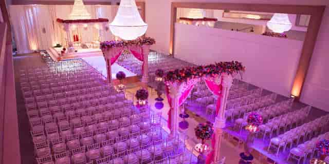 Elegant Meridian Ballroom with chandeliers, ideal for weddings and formal events.