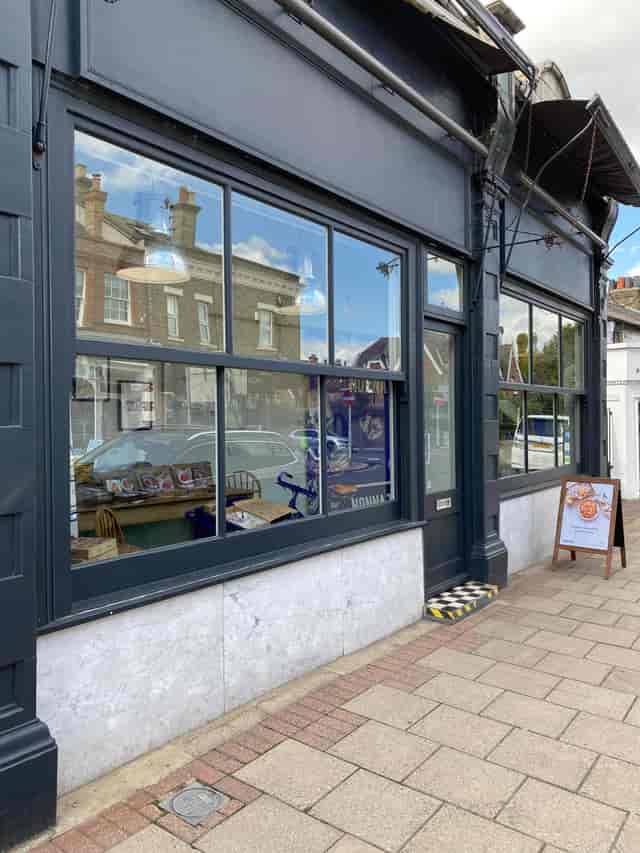 Charming event venue with large windows for meetings and workshops at 15 Church Road.