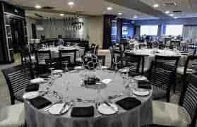 Moncur Suite in St. James Park: elegant dinner setup for corporate events.