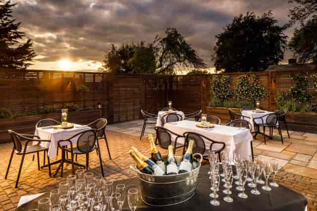 Elegant outdoor event space at Mercure Oxford with sunset backdrop for upscale receptions.