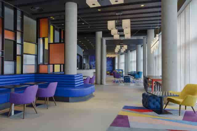 Vibrant WXYZ bar at Aloft London ExCeL, ideal for networking and social events.