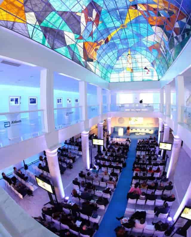 Venus Room at Palacio Neptuno: tiered seating for engaging conferences and presentations.
