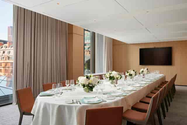 Elegant meeting space with floral decor for corporate events in Pan Pacific London.
