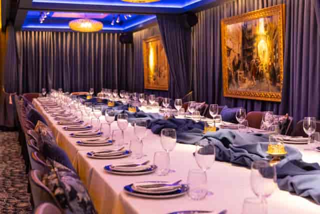 Elegant dining table in Sapphire Room, perfect for upscale events and corporate dinners.