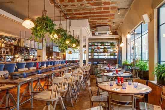 Stylish Riding House Cafe venue with modern decor for events and meetings.
