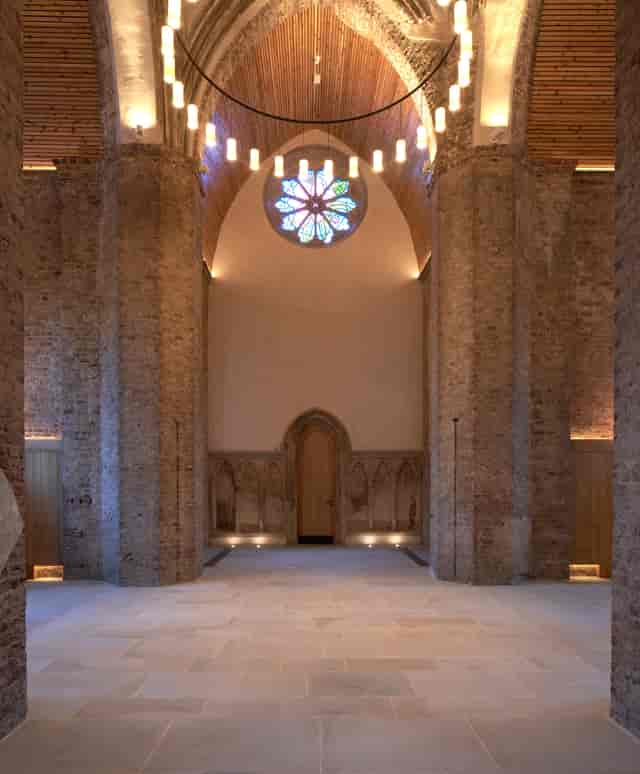 Elegant Abney Park Chapel venue with vaulted ceilings, perfect for events and gatherings.