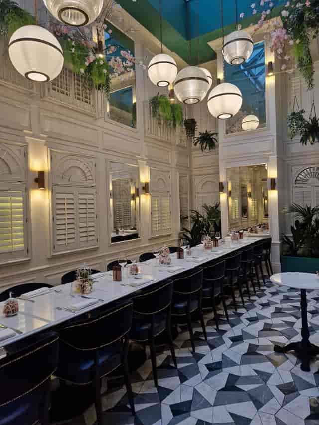 Elegant dining space at Botanica, 100 Queen's Gate Hotel, ideal for events and gatherings.