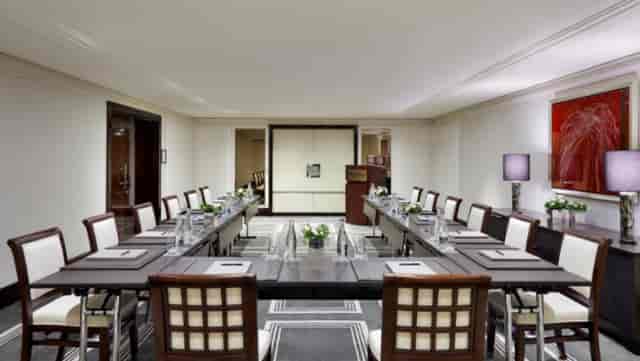 August Boppe Meeting Room, elegant table setup for corporate events in The Peninsular Paris.