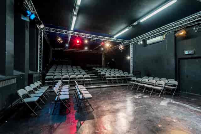 Theatre Space with tiered seating for versatile events at The Courtyard Theatre.