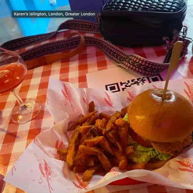 Karen's Diner in London with colorful tablecloth, ideal for casual networking events.