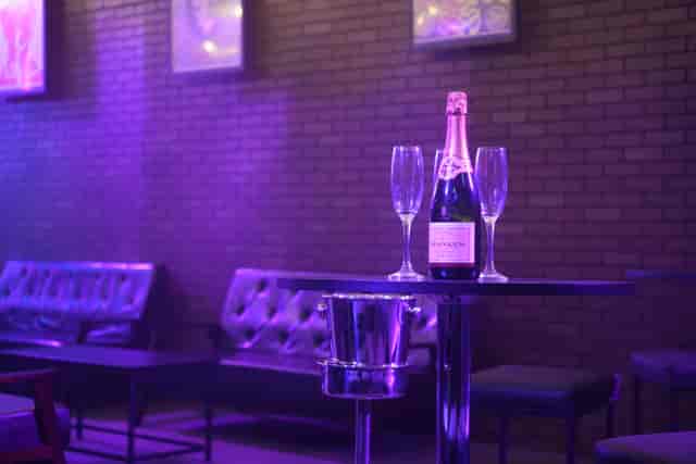 Stylish event setup with champagne flutes in Fusion Creative Studios, ideal for upscale gatherings.