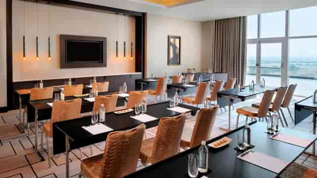 Dubai Ballroom 1-2 at JW Marriott: sleek meeting room with natural light for professional events.