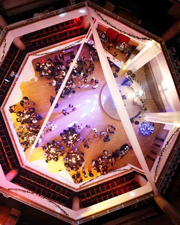 Aerial view of Cornerstone Event space with elegantly arranged tables for corporate gatherings.
