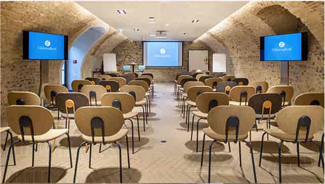 Meeting Room at Château de Herces with modern layout, ideal for corporate events.