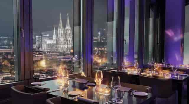 Sophisticated dining venue with city view, ideal for corporate events and exclusive gatherings.