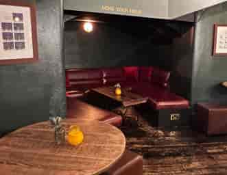 Basement Bar booth seating for intimate VIP networking and breakout events.