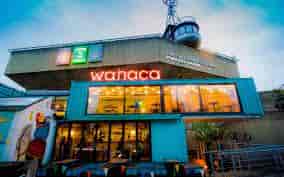 Vibrant Wahaca Southbank venue with modern architecture for casual meetings and events.