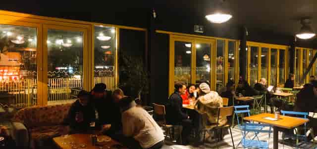 Cozy Nico's Bar in Hackney Bridge, perfect for intimate gatherings and networking events.