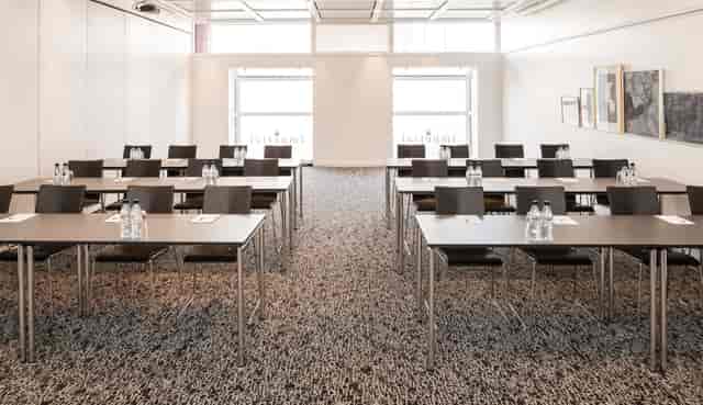 Meeting room at Imperial Hotel, Rådhuspladsen, bright and organized for professional events.