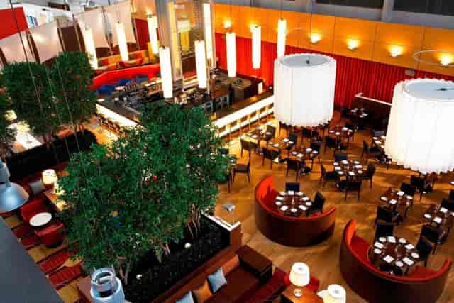 Modern restaurant interior with circular booths, ideal for events in Portsmouth.
