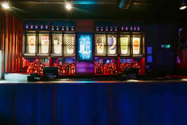 Vibrant Baa Bar venue in Nottingham with illuminated drink dispensers for events.