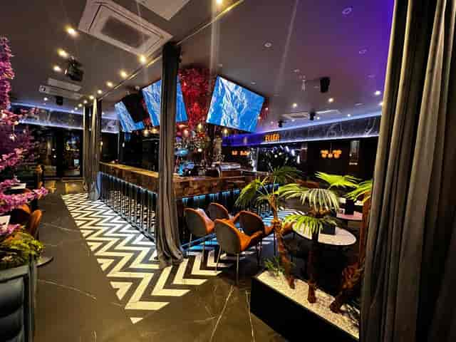 Vibrant event space at Pizza Loca with modern decor for networking and social gatherings.