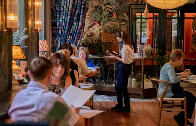 Vibrant dining space at Whole Restaurant, ideal for intimate gatherings and networking events.